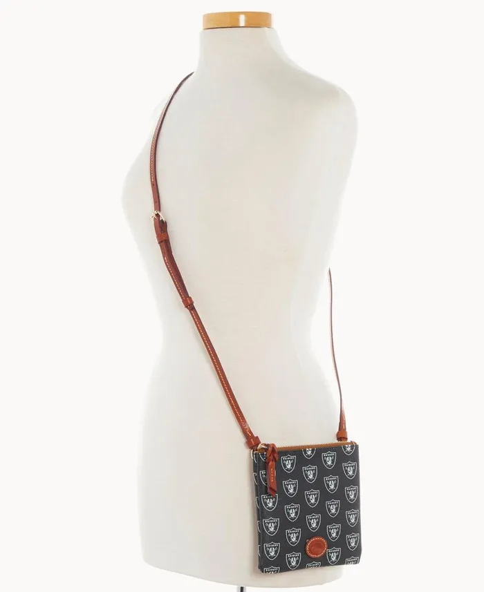 Dooney and Bourke NFL Raiders Small North South Top Zip Crossbody Raiders WomenMen Crossbodies Dooney and Bourke NFL Raiders Small North South Top Zip Crossbody Raiders WomenMen Crossbodies