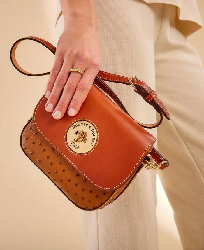 Dooney and Bourke Ostrich Turnlock Flap Saddle Caramel WomenMen Crossbodies