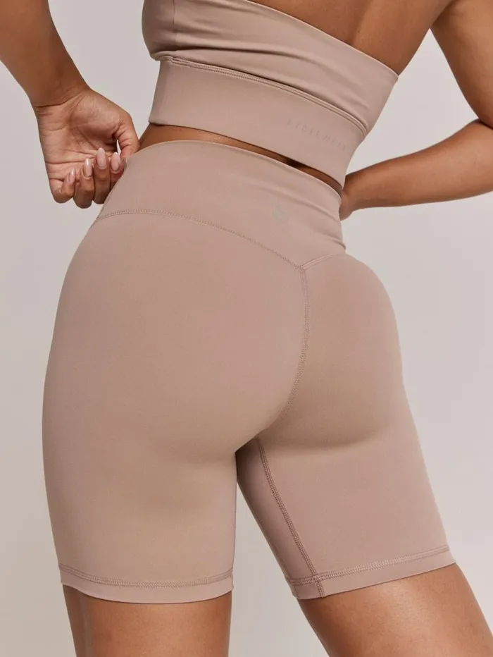 Gym Shorts Womens Ryderwear NKD Arch MidLength Shorts Taupe