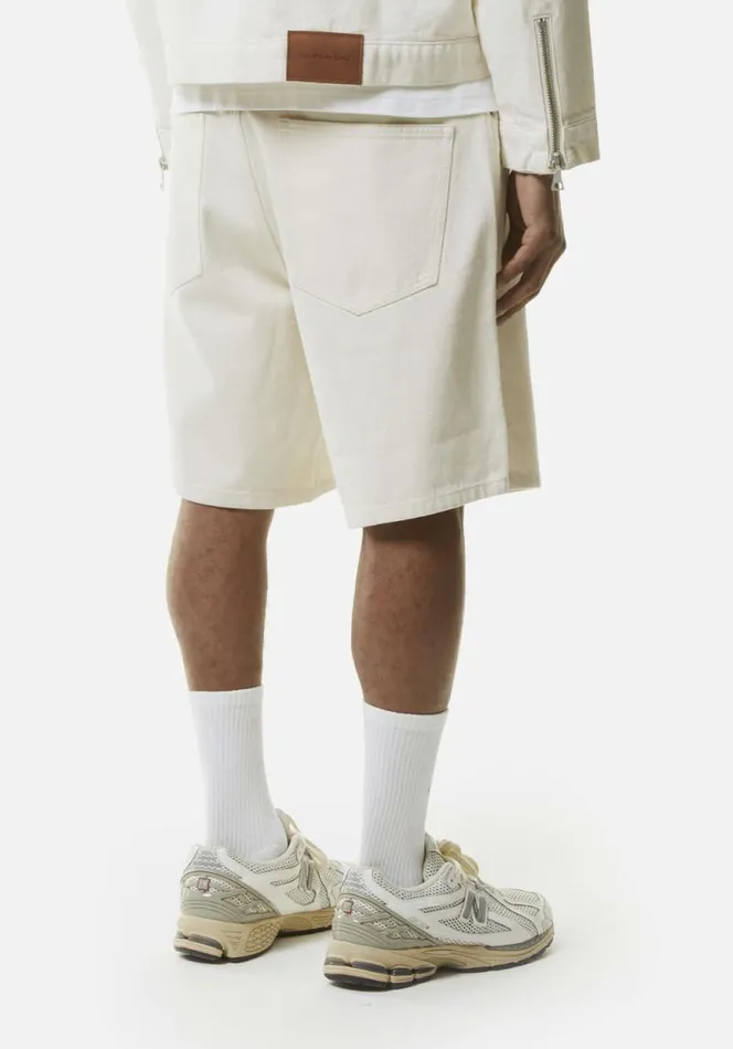 Shop MKI 16OZ DENIM SHORTS Off White MKI MIYUKI ZOKU Shorts Shop MKI 16OZ DENIM SHORTS Off White MKI MIYUKI ZOKU Shorts