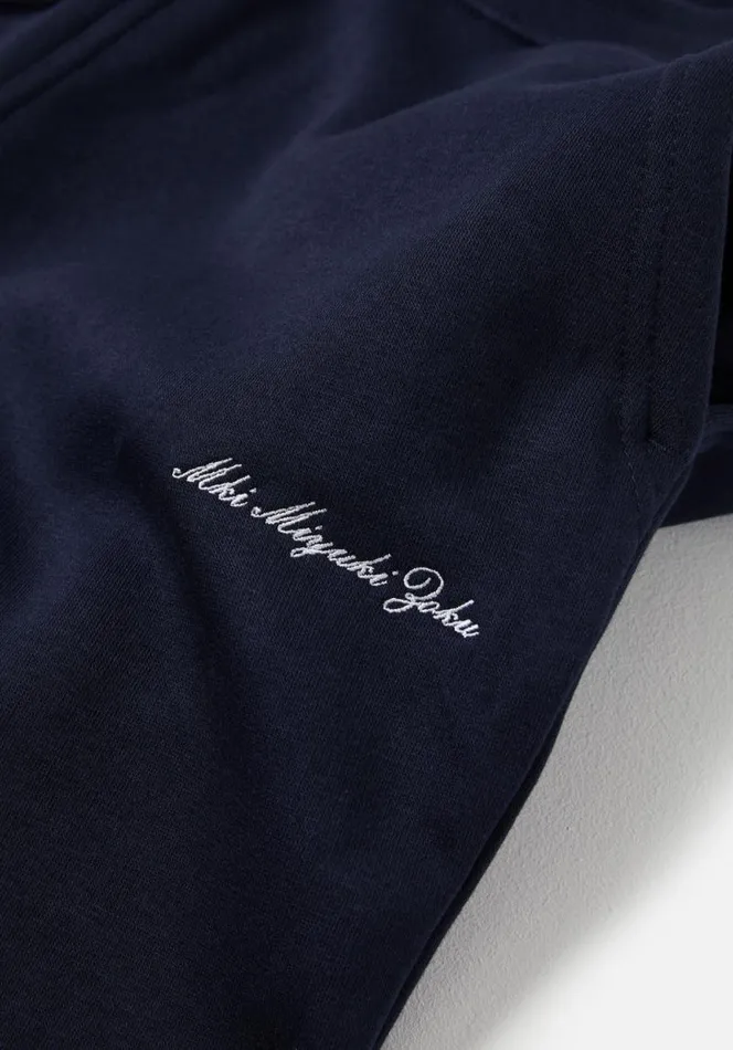 Shop MKI EMBROIDERED EMBASSY JOGGERS Navy MKI MIYUKI ZOKU Trousers