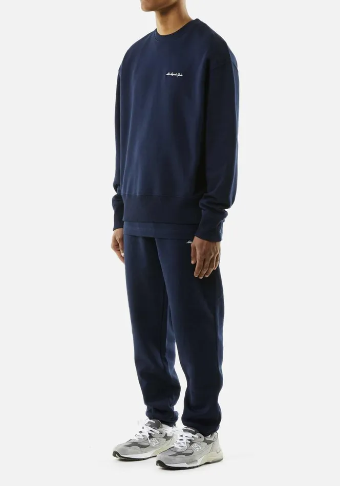 Shop MKI EMBROIDERED EMBASSY JOGGERS Navy MKI MIYUKI ZOKU Trousers