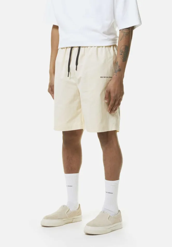 Shop MKI FLORAL COTTON LINEN SHORTS Ecru MKI MIYUKI ZOKU Shorts