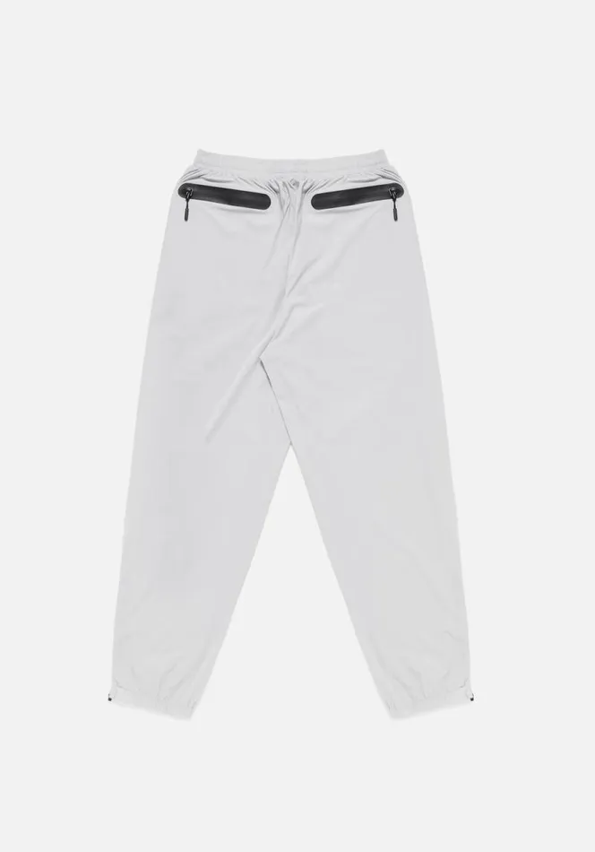 Shop MKI LIGHTWEIGHT SHELL TRACK PANTS Light Grey MKI MIYUKI ZOKU Trousers