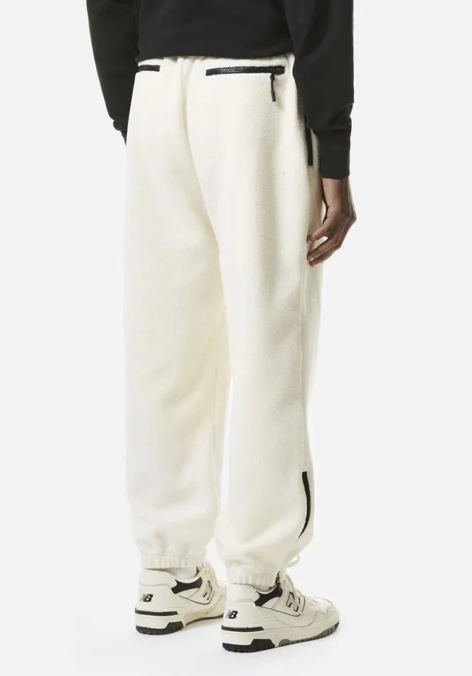 Shop MKI POLAR FLEECE TRACK PANTS Off White MKI MIYUKI ZOKU Trousers