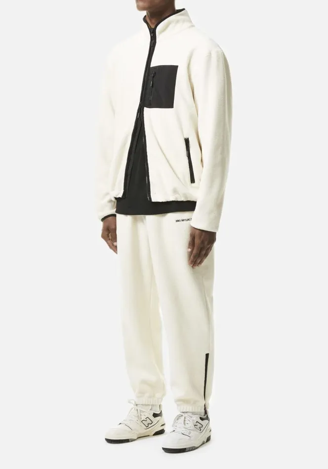 Shop MKI POLAR FLEECE TRACK PANTS Off White MKI MIYUKI ZOKU Trousers