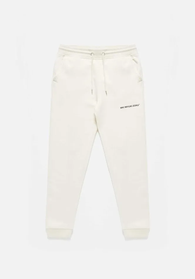 Shop MKI STAPLE JOGGERS Ecru MKI MIYUKI ZOKU Trousers
