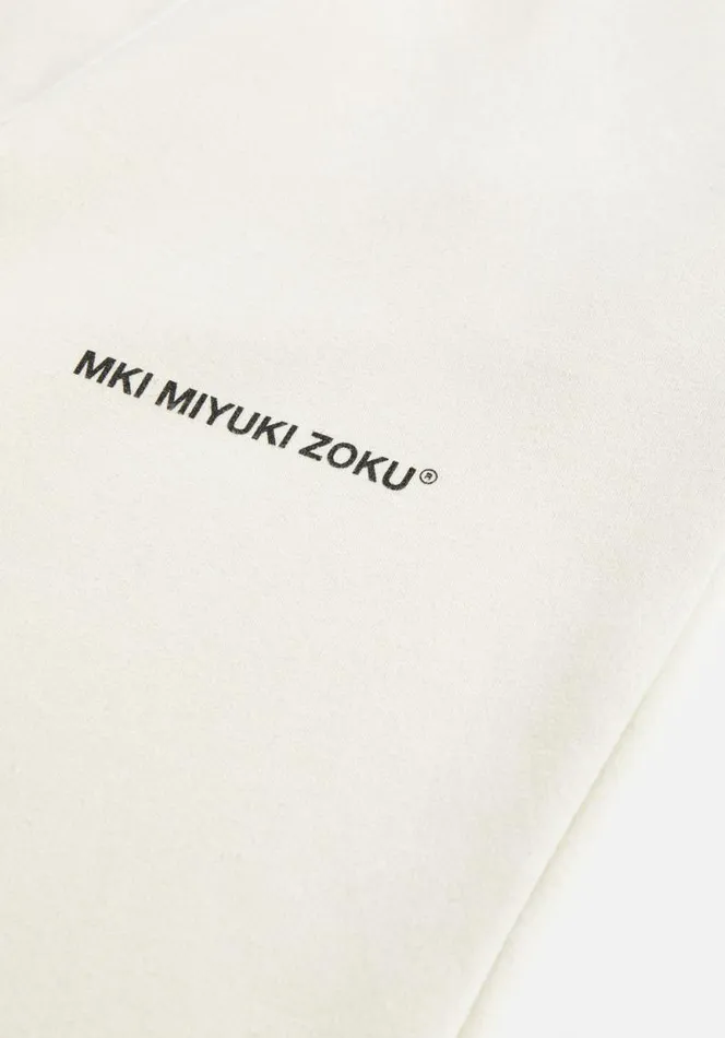 Shop MKI STAPLE JOGGERS Ecru MKI MIYUKI ZOKU Trousers