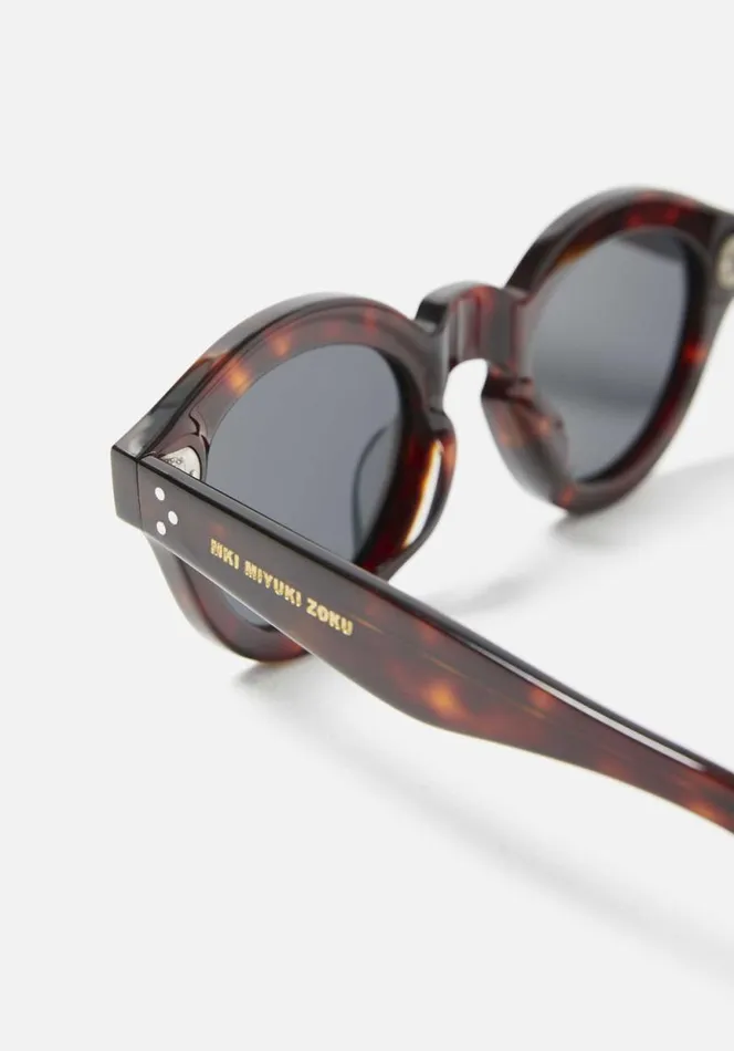 Shop MKI THICK KEYHOLE ACETATE SUNGLASSES Tortoise MKI MIYUKI ZOKU Eyewear Shop MKI THICK KEYHOLE ACETATE SUNGLASSES Tortoise MKI MIYUKI ZOKU Eyewear