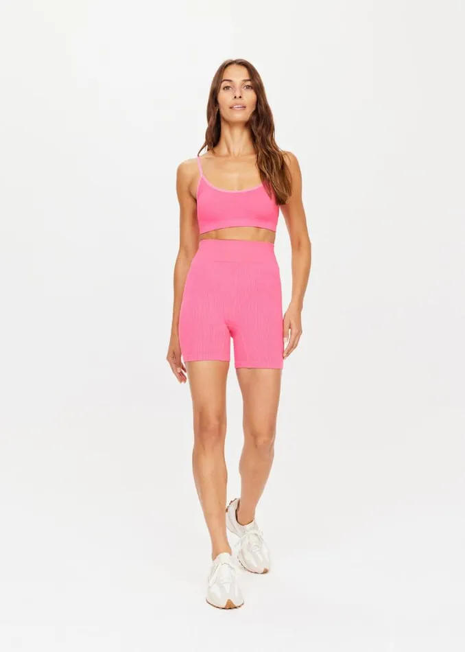 The Upside RIBBED SEAMLESS BALLET BRA Neon Pink Shop Sports Bras The Upside RIBBED SEAMLESS BALLET BRA Neon Pink Shop Sports Bras